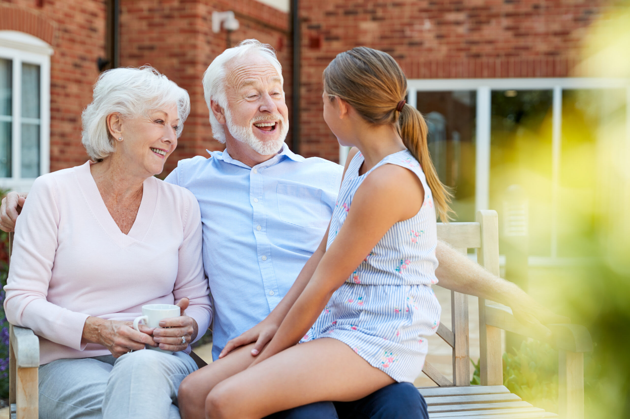 A young girl visits her grandparents in assisted living.